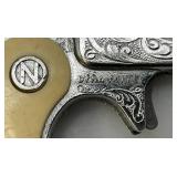 Misc. Vintage Miniature Cap Guns Two Break Open Pistols With Cow Adorned Handles And One Derringer (Missing Hammer)