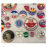Vintage Collection Of Political Buttons And Bumper Stickers In Glass Front Display Case