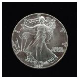 1987 Silver Eagle - 99.9% pure silver One Troy Ounce  - Like new uncirculated! TAX EXEMPT  Bright and detailed