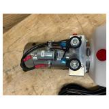 12V DC double-acting hydraulic power unit with an 8-quart plastic reservoir (untested)