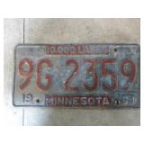 Vintage Washboard and License Plates