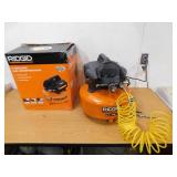 RIDGID 6 Gal. 150 PSI Portable Electric Oil-Free Jobsite Pancake Air Compressor with Dual Pressure Gauges and 2-Quick Couplers