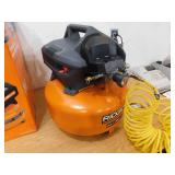 RIDGID 6 Gal. 150 PSI Portable Electric Oil-Free Jobsite Pancake Air Compressor with Dual Pressure Gauges and 2-Quick Couplers
