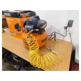 RIDGID 6 Gal. 150 PSI Portable Electric Oil-Free Jobsite Pancake Air Compressor with Dual Pressure Gauges and 2-Quick Couplers