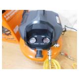 RIDGID 6 Gal. 150 PSI Portable Electric Oil-Free Jobsite Pancake Air Compressor with Dual Pressure Gauges and 2-Quick Couplers