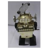 Robot Tin Wind-Up Toy on Display Base - Vintage Space Explorer, 1950s