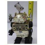 Robot Tin Wind-Up Toy on Display Base - Vintage Space Explorer, 1950s