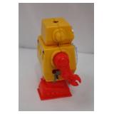 Vintage Yellow Robot Toy - Red Arms, 6-Inch Plastic Figure