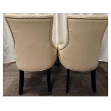 Pair of Tufted Beige Accent Chairs with Nailhead Trim