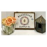 Beekeeper Supply Co. Sign & Birdhouse & Peach Roses in Glass Vase