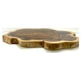 Live Edge Wood Slab Cross-Section with Prominent Growth Rings and Natural Edge