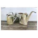 2 - Vintage Metal Watering Cans - One has a wooden handle
