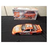 Action Tony Stewart #20 die cast Nascar race car bank with key. 1 of 3600