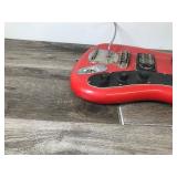 Red & Black Electric Guitar - Not sure the brand but I believe it says Jennifer on the head of guitar