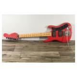Red & Black Electric Guitar - Not sure the brand but I believe it says Jennifer on the head of guitar
