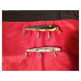 Vintage Creek Chub Co. Pikie Minnow musky fishing lure and a vintage wooden musky lure