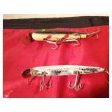 Vintage Creek Chub Co. Pikie Minnow musky fishing lure and a vintage wooden musky lure