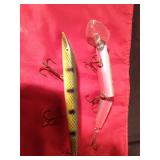 Joe butcher jointed depth Raider musky lure and a vintage wooden Musky lure