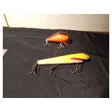Vintage fishing lure possibly a Rapala down deep Rattlin Fat Rap, and a vintage wooden Musky lure