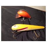 Vintage fishing lure possibly a Rapala down deep Rattlin Fat Rap, and a vintage wooden Musky lure