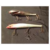 1 Vintage wooden and 1 plastic with glass eyes musky lures