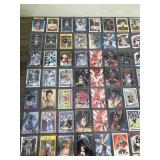 Lot of Trading Cards - Football - Basketball - Hockey & Baseball / All of them are in Top Loaders