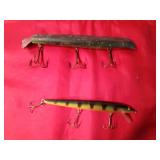 2 Wooden Musky fishing lures (1 is a Rapala) (1 with metal tail)