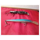 Vintage wooden jointed body Musky fishing lure and a plastic large minnow lure