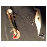 1 Rubber Musky Innovation Spring Bull Dawg lure and 1 other large fishing lure