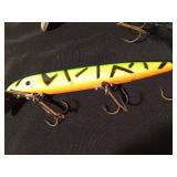 Customed painted Rapala Down deep Husky Jerk fishing lure and a vintage wooden jointed body Musky fishing lure