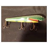 Vintage wooden Musky fishing lure and a Rapala 3 hook fishing lure