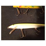 Vintage wooden Musky fishing lure and a Rapala 3 hook fishing lure