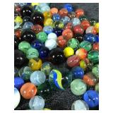 Lot of Collectible Marbles  - Some of them glow green when you put a black light on them
