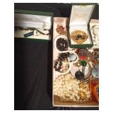 Flat of jewelry including Connemara Marble pin and necklace made in Ireland and Monet earrings