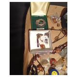 Flat of jewelry including a Jade necklace/earring set and a sterling silver Irish Hall marked pin