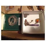 Flat of jewelry including a Jade necklace/earring set and a sterling silver Irish Hall marked pin