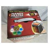 New Handy Heater Pure Warmth Ceramic Space Heater with LED Lights