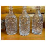 Antique Tantalus Set with Three Cut Glass Decanters and Silver-Plated Stand