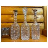 Antique Tantalus Set with Three Cut Glass Decanters and Silver-Plated Stand