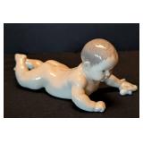 K - Royal Copenhagen Lying Baby Figurine - Model 1739