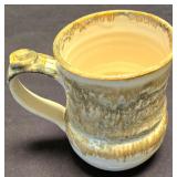 LR - Decorative Tableware Lot: Ivory Oval Tray; Blue/Rust Tray; Blue Vase; Brown & Tan Mugs; Candleholders