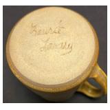 LR - Decorative Tableware Lot: Ivory Oval Tray; Blue/Rust Tray; Blue Vase; Brown & Tan Mugs; Candleholders