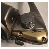 LR - Okuma Sentry STR-25 Reel & Shimano Sahara 2000FA Reel