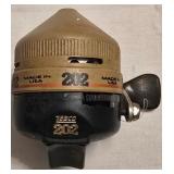 LR - Garcia Mitchell 308 & Zebco 202 Reels