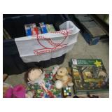 Covered tote filled with toys puzzl...