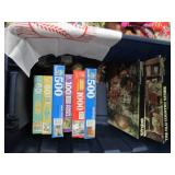 Covered tote filled with toys puzzl...