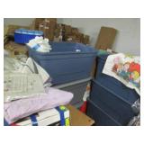 2 Large tubs filled with bedding an...