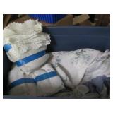 2 Large tubs filled with bedding an...