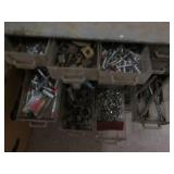 Metal parts organizer filled with h...