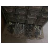 Metal parts organizer filled with h...